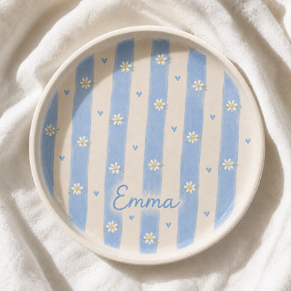Blue striped personalized ceramic trinket dish on fabric with Emma name