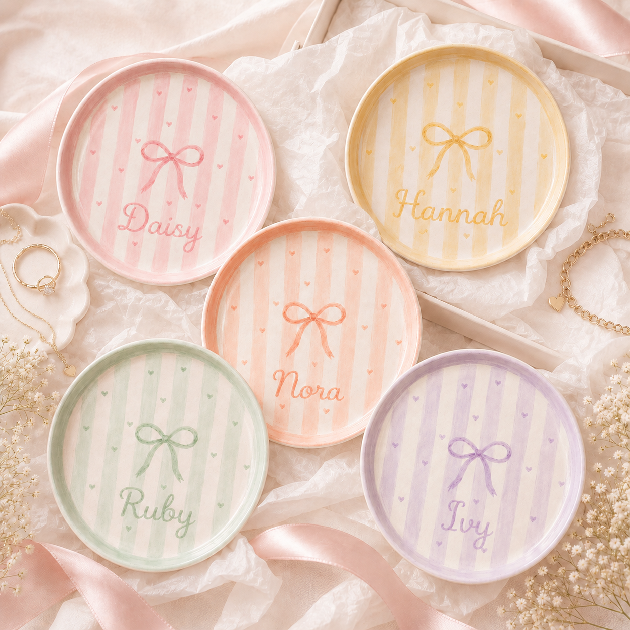 Personalized bow ceramic trinket dish collection on satin fabric
