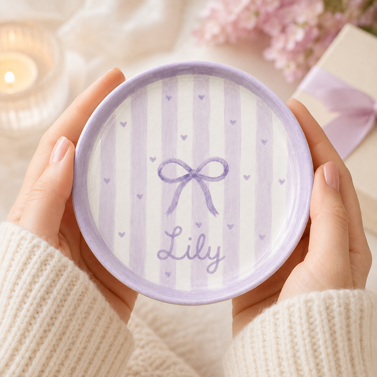 Lavender bow personalized ceramic trinket dish held in hands with Lily name