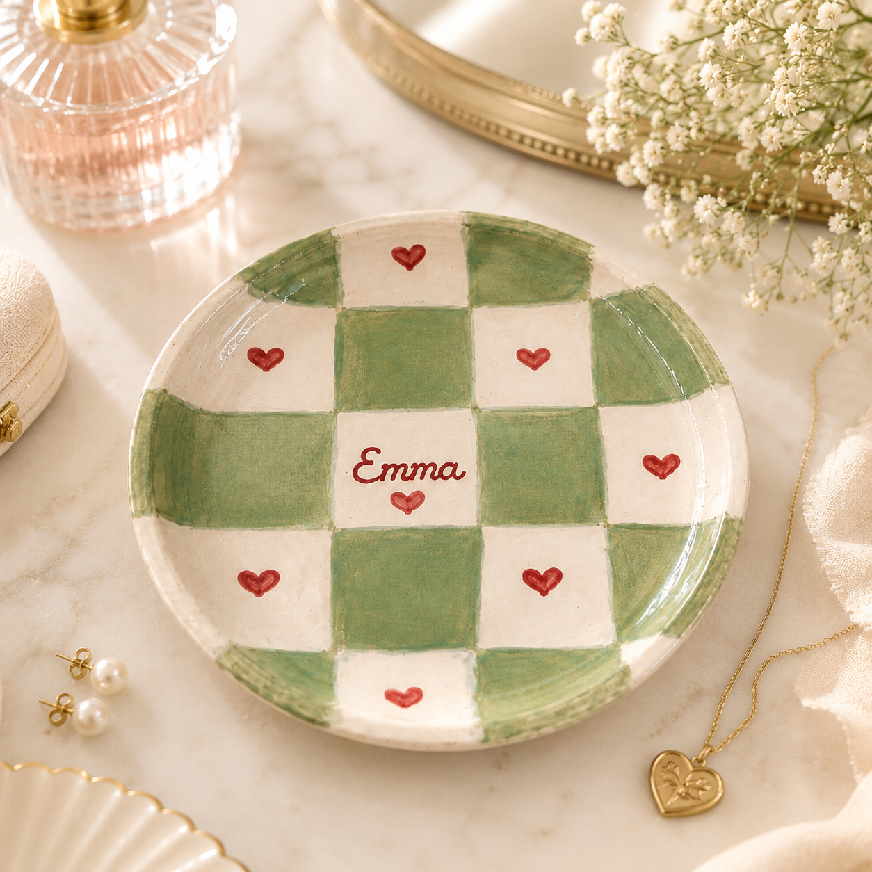 Green checkered personalized ceramic trinket dish styled with jewelry