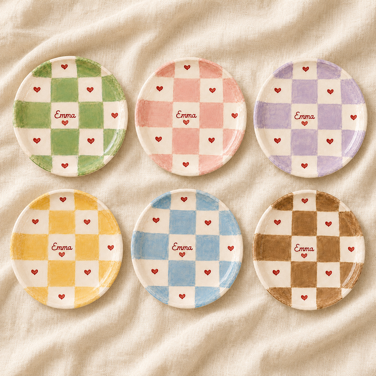Checkered heart personalized ceramic trinket dish collection on fabric