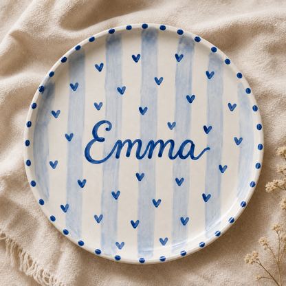 Blue heart personalized ceramic name plate flat lay