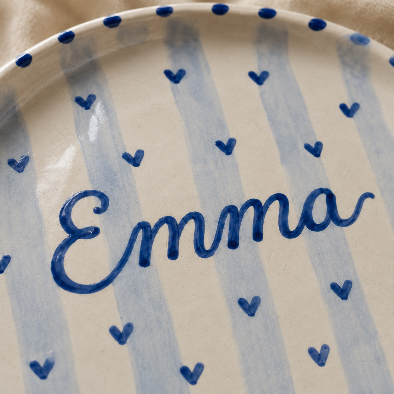Close up of personalized ceramic plate brush texture